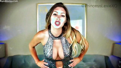 Princess Lexie in sparkling low-cut dress, white face mask, seductive open-mouth pose