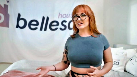 Redhead MILF Arabelle Raphael in crop top and stockings on bed
