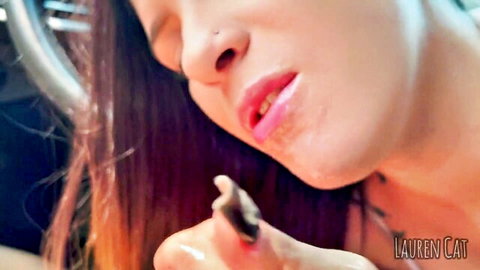 Lauren Cat close-up in car, teasing with tongue and hand before beach cumshot