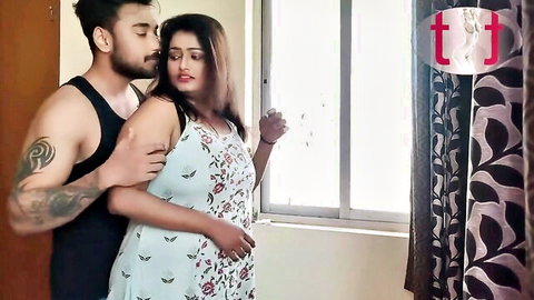 Tattooed guy embraces hot Indian stepmom in blue floral dress