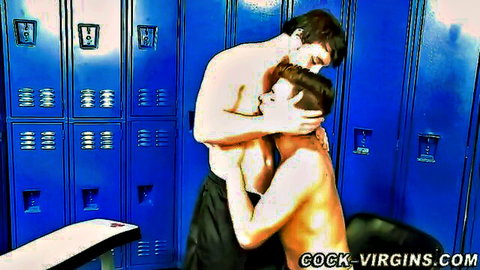 Muscular gay studs embracing intimately in steamy locker room hookup