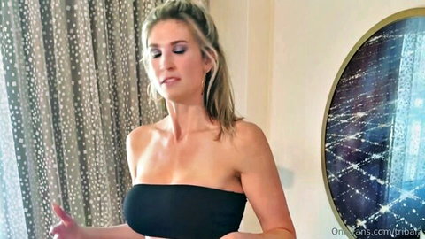 Daphne Dreams blonde in black tube top, seductive pose