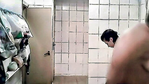 Skinny brunette and BBW mature lady in steamy shower room voyeur style