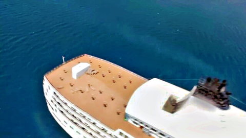 Aerial view of luxury cruise ship deck in 'Adventures on the Lust Boat' with Tarra White
