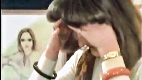Vintage brunette in white blouse teasing with bangles, classic XXX thumbnail