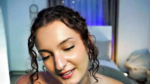 LoveelyLunaa smiling topless in bathtub on MyFreeCams cam show