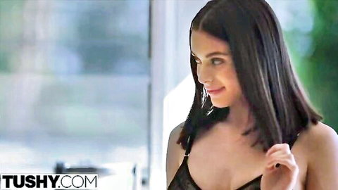 Lana Rhoades in black lingerie, seductive smile and pose