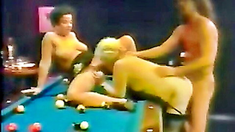 Vintage blonde bent over pool table with bare ass up as naked man grips hips for doggy fuck while nude black woman watches