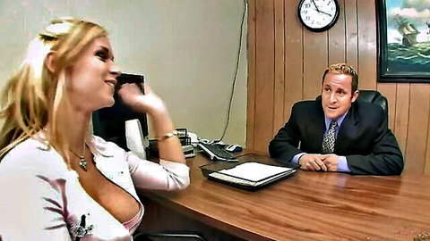 Sarah Vandella as busty blonde in low-cut top during office job interview