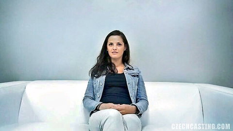 Czech Casting Lucy, brunette model in denim jacket, seated pose