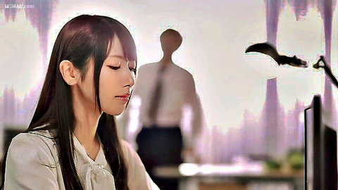 Petite Japanese office girl in white blouse at desk with boss silhouette behind