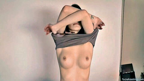 Belle Claire pulling up tank top, exposing perky breasts in solo casting tease