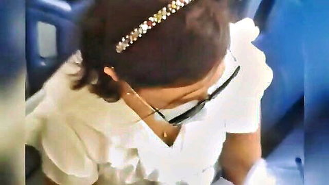 Mature woman wearing white ruffled blouse and sunglasses on bus teasing flash