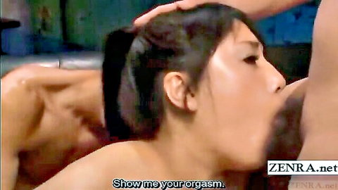 Skinny Japanese girl deepthroats cock with hand guiding her head in sweaty blowjob