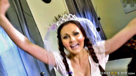 Tina Kay as sexy bride in tiara and veil, pigtails, arms raised excitedly