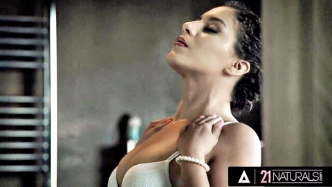 Seductive Liv Revamped in white bra, wet curly hair, sensual pose