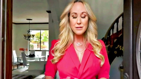 Blonde mature stepmom in open red blazer showing cleavage, teasing creampie fantasy