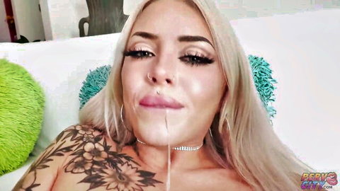 Tattooed blonde Nichole Saphir with cum facial after hardcore anal