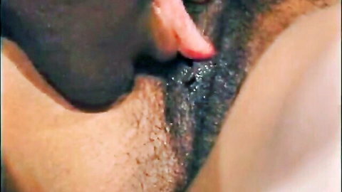 Ebony BBW's hairy pussy licked by man in closeup