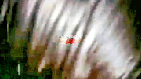 Blurry closeup of woman's open mouth with thick cum dripping from lips after facial