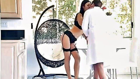Jasmin Jae in black lingerie kissing man in robe, blowjob tease