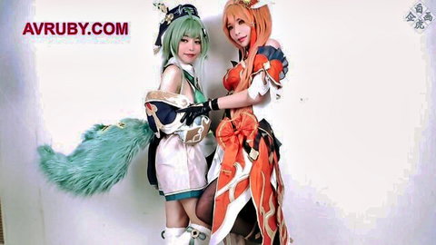 Two Asian cosplay girls in revealing fantasy outfits posing together