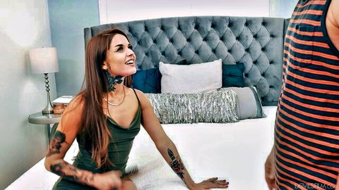 Vanessa Vega tattooed redhead babe smiling in green slip on bed