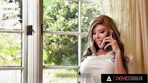 Brittney Kade, busty trans in white top, seductive phone call