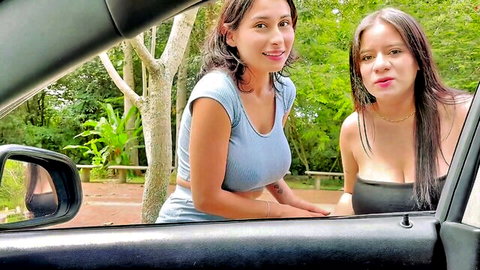 Jenifer Play and friend teasing with cleavage in car outdoor fun
