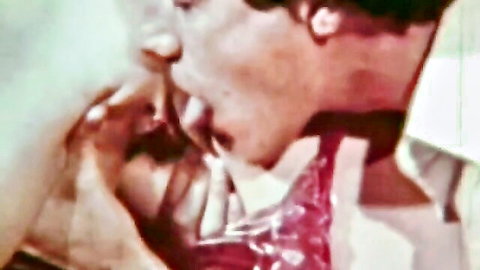 Vintage couple in passionate kiss from Fantasy Girl classic XXX