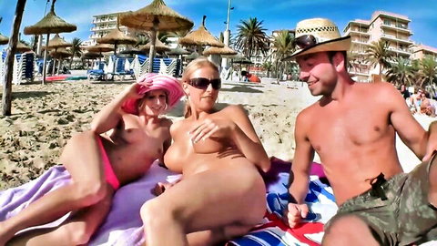 Hot German teens topless threesome on Mallorca beach holiday