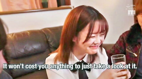 Asian schoolgirl in uniform laughs while offering drink in girlfriend swap tease
