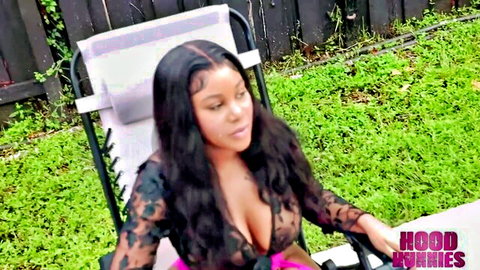 Jordyn Falls in revealing black lace top and pink bottoms, teasing curves