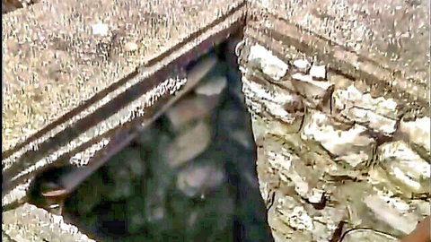 Blurry stone hole scene in Daughter of Lust episode, mysterious outdoor tease