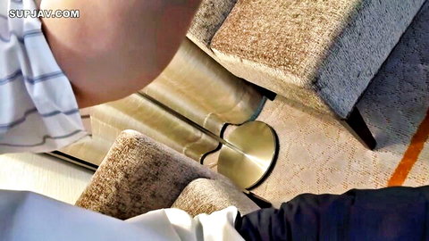 POV closeup of Japanese brunette's neck and chin during blowjob on luxury sofa