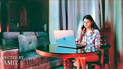Indian lady boss in plaid shirt on phone with laptop, threesome tease