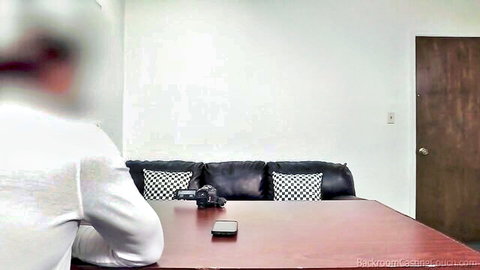 Xia in anal casting session, back view of woman at table