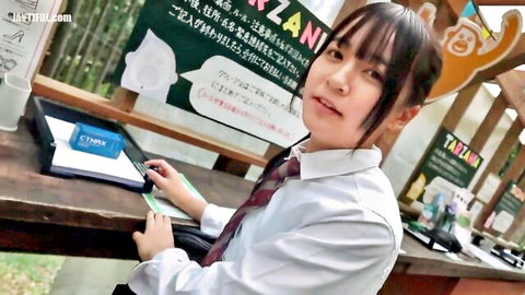 Cute Japanese amateur in school uniform at festival booth, smiling debut photoshoot