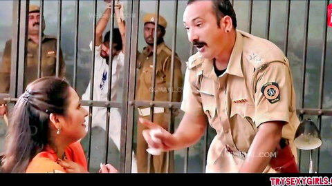 Indian MILF in orange saree flirts with police officer in jail cell