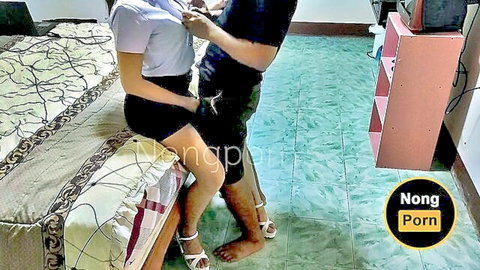 Thai schoolgirl in white uniform skirt seduced by man on bed