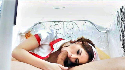 Angel Dickens as sexy nurse giving intense blowjob in bed