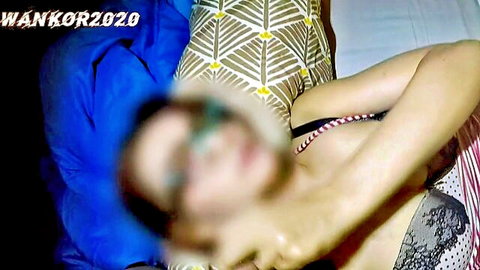 Sexy blurred Asian teen in black lace lingerie posing seductively on bed with big tits