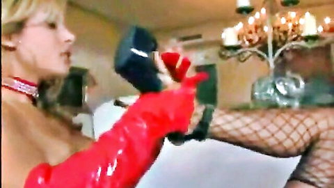 Teanna and Xara in red latex gloves and fishnet stockings tease