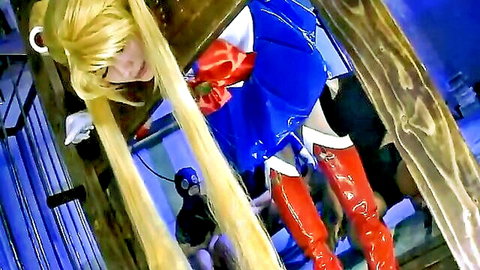 Blonde Sailor Moon cosplayer bent over for anal sex in blue skirt and red boots