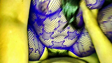 Horny Thai mom in sexy purple fishnet lingerie, teasing curves