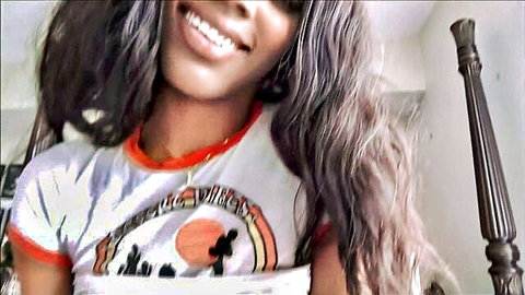 Jordy Love, sexy Black stepsis smiling in cropped vintage tee