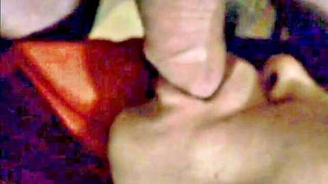 Close-up of Asian woman deepthroating in homemade blowjob video