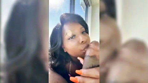 Seductive ebony woman with full lips in teasing close-up baecation pose