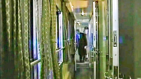 Anita Rinaldi and Gina Colany in train corridor, The Last Train 1994