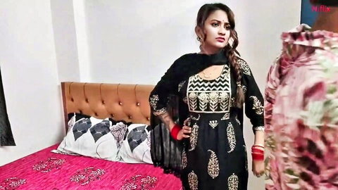 Sexy Indian Desi MILF in black traditional dress, teasing in bedroom